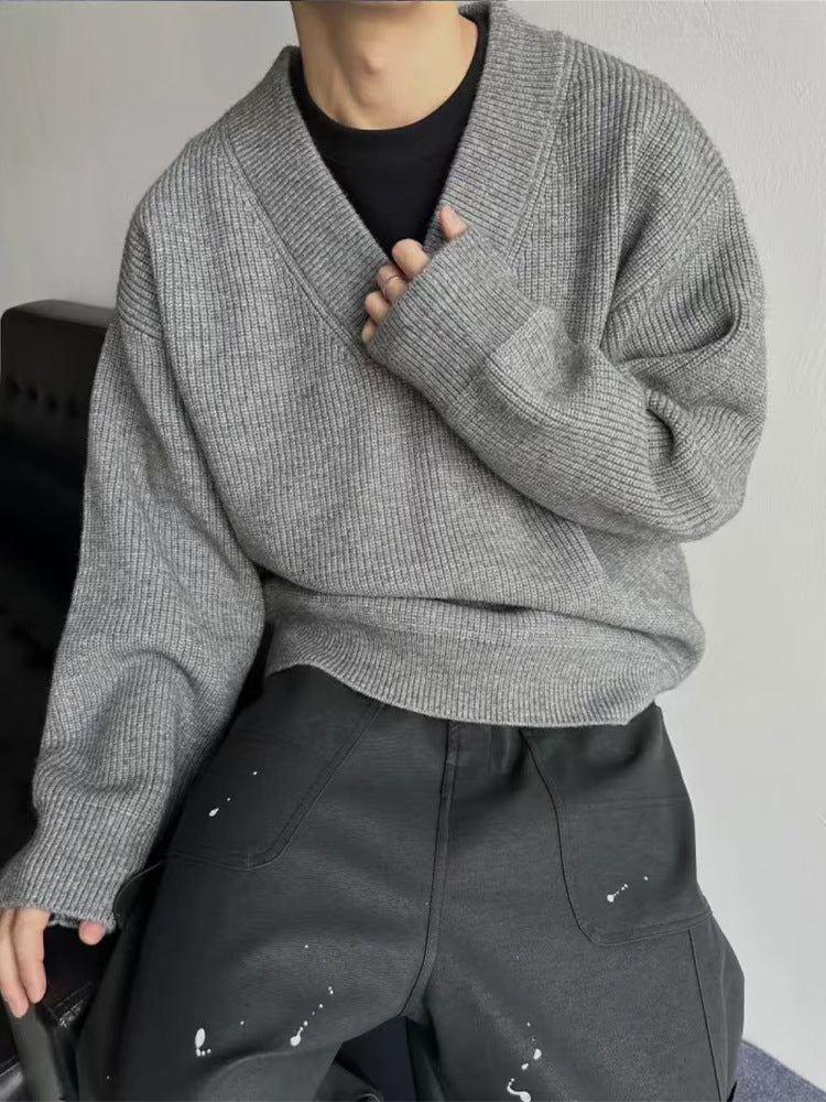 Layered Look With A Relaxed Knit Cardigan Over A Base Top